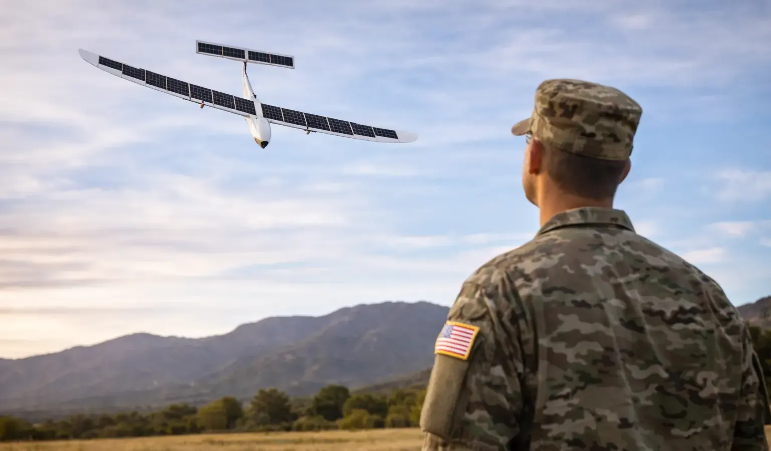 A K1000ULE solar-powered drone being prepared for flight at Fort Carson by a two-person Army crew
