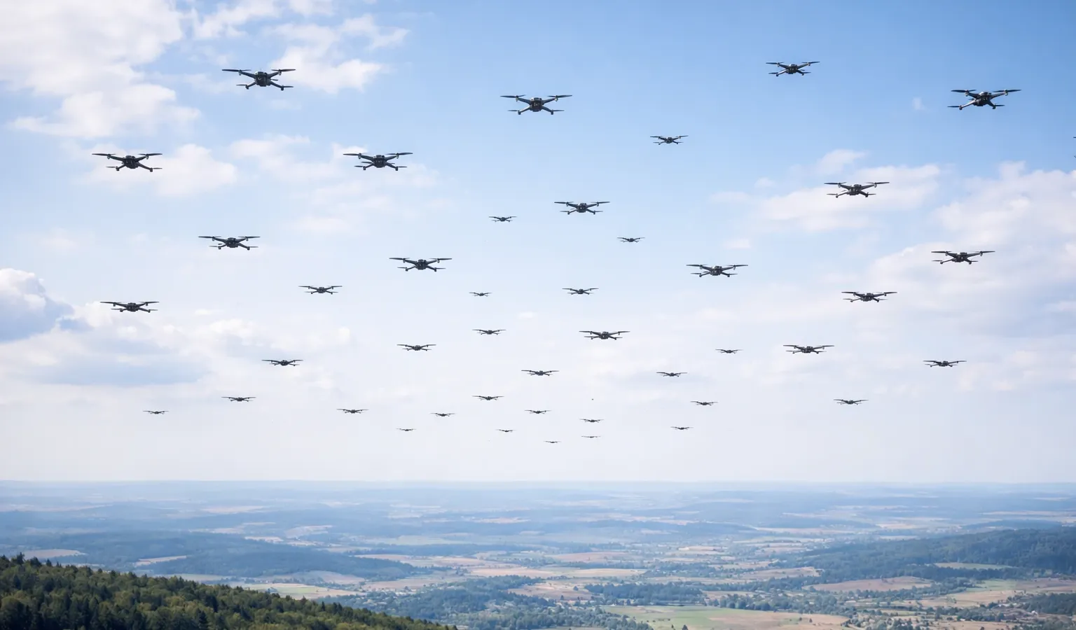 Multiple small drones flying in formation representing the emerging drone swarm threat to military bases
