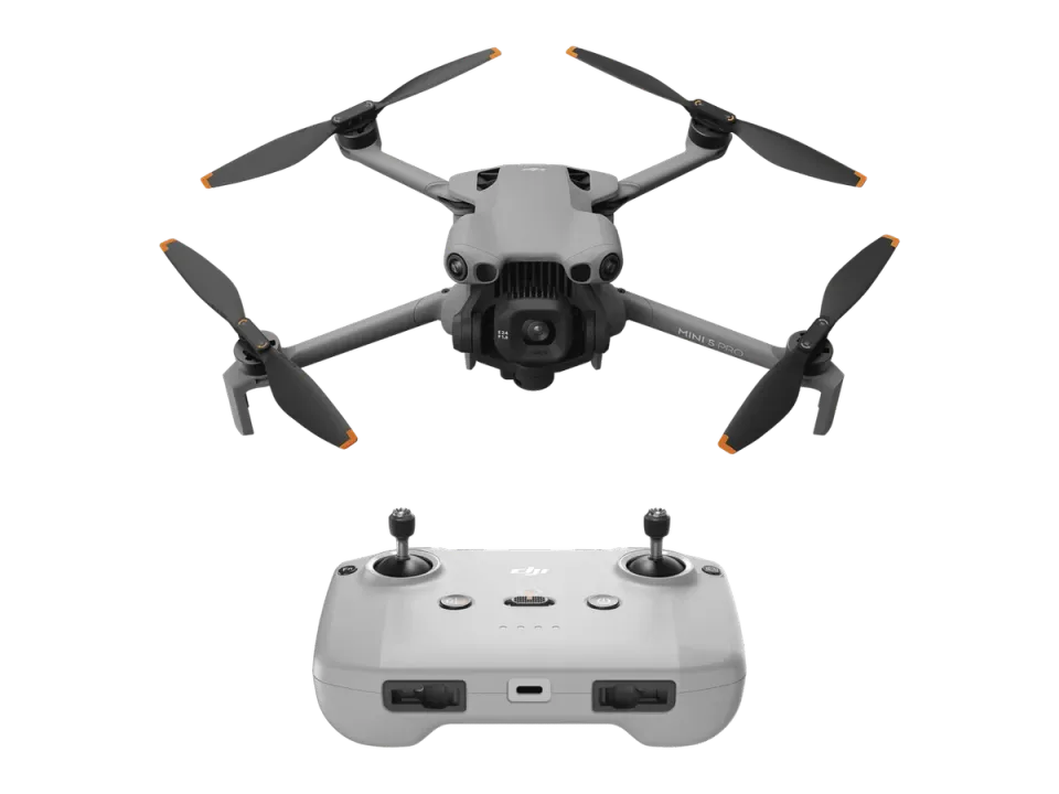 DJI Mini 5 Pro folding consumer drone with its remote controller