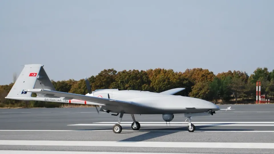 Bayraktar TB2 drone with laser-guided munitions on underwing hardpoints in flight