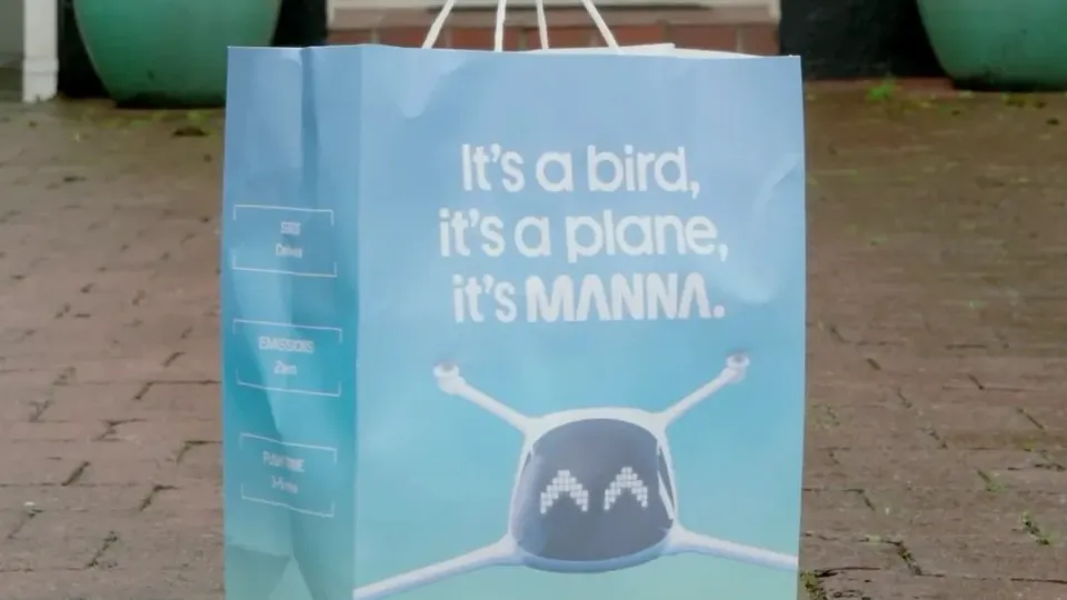 Manna drone delivering a package to a residential garden in Dublin Ireland