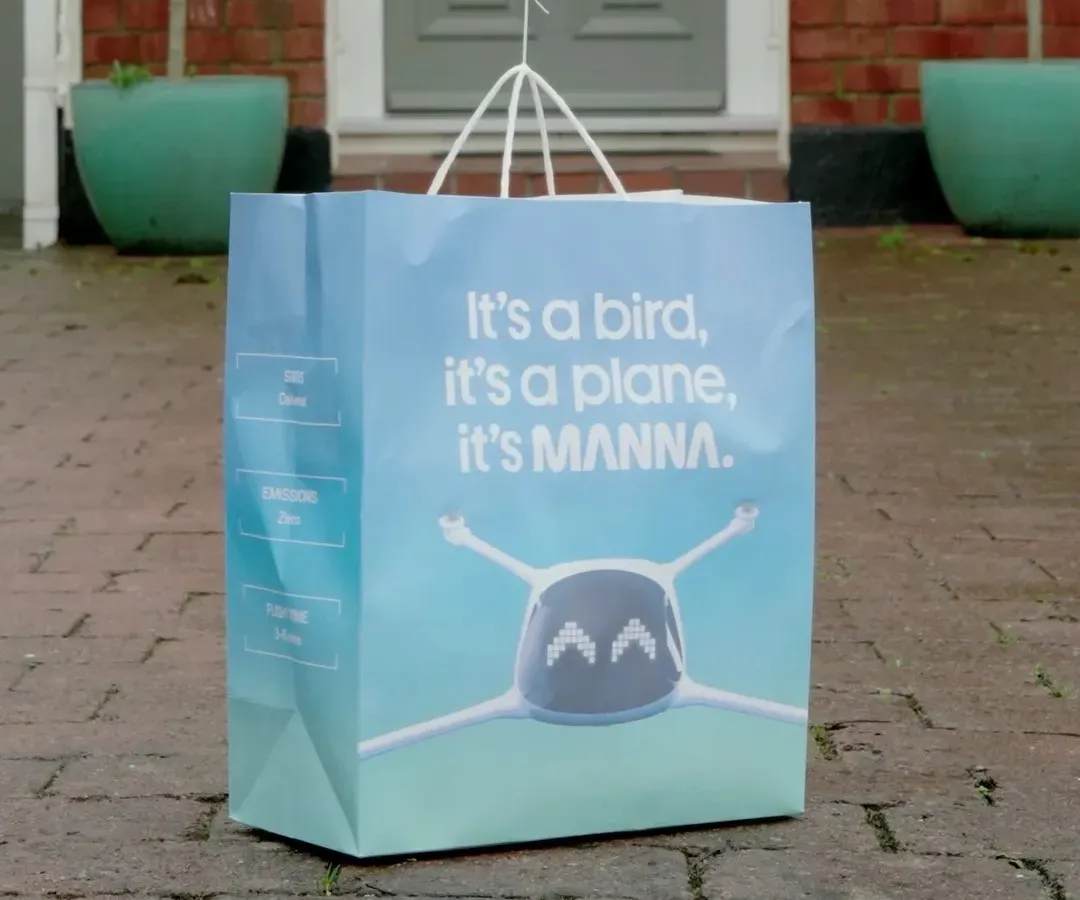 Manna drone delivering a package to a residential garden in Dublin Ireland