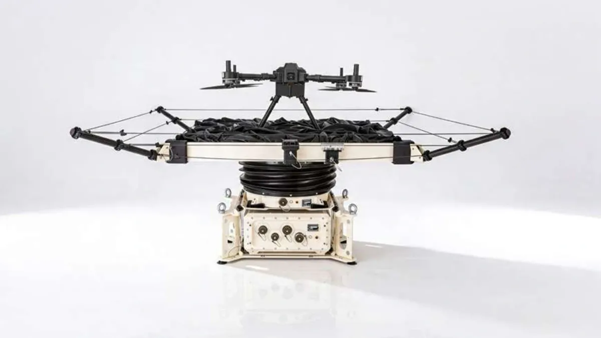 Gyro-stabilized drone landing pad mounted on a small offshore vessel in open water