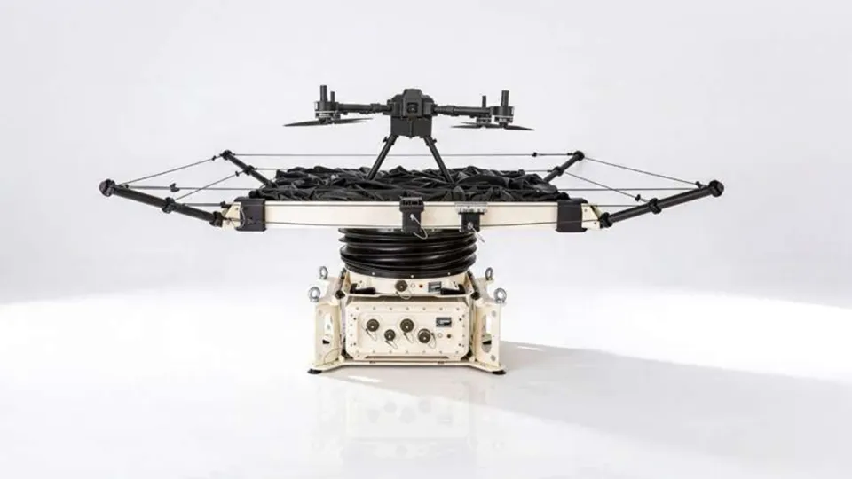 Gyro-stabilized drone landing pad mounted on a small offshore vessel in open water