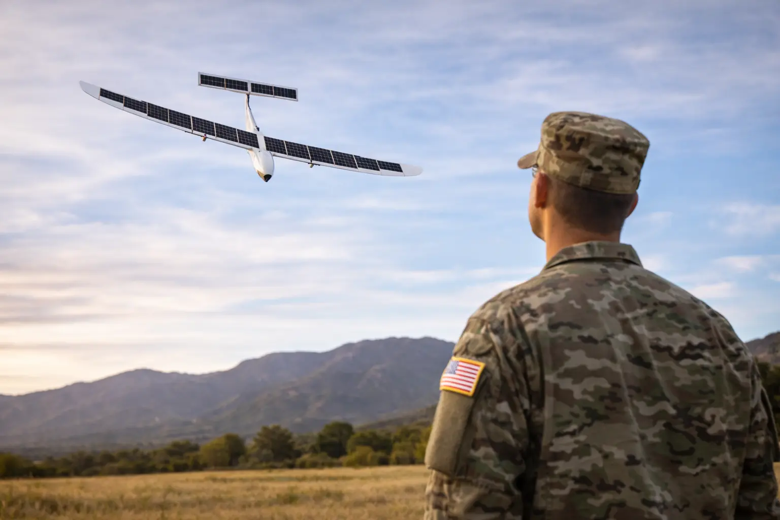 A K1000ULE solar-powered drone being prepared for flight at Fort Carson by a two-person Army crew