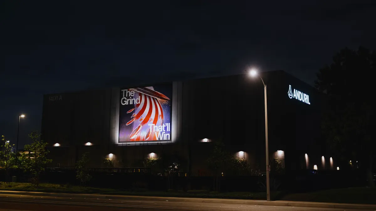 Anduril Industries headquarters building in Costa Mesa California at night with street lights
