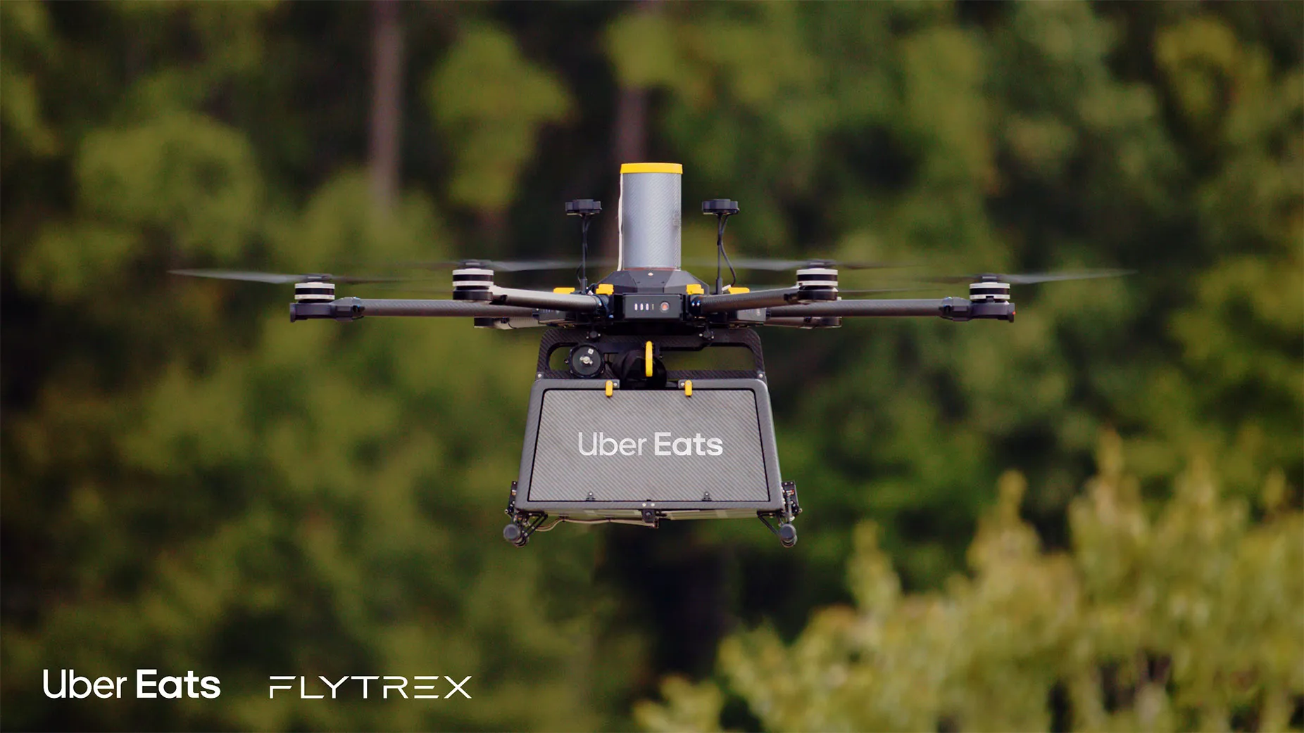 Flytrex Sky2 octocopter carrying a food delivery order over a Texas neighborhood