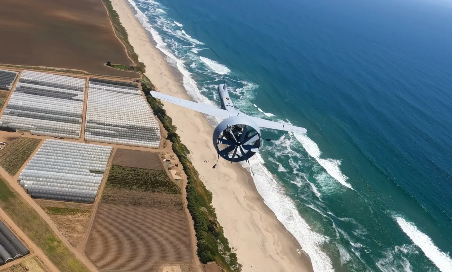 V-BAT unmanned aerial system preparing for vertical takeoff from a Navy amphibious transport dock ship deck