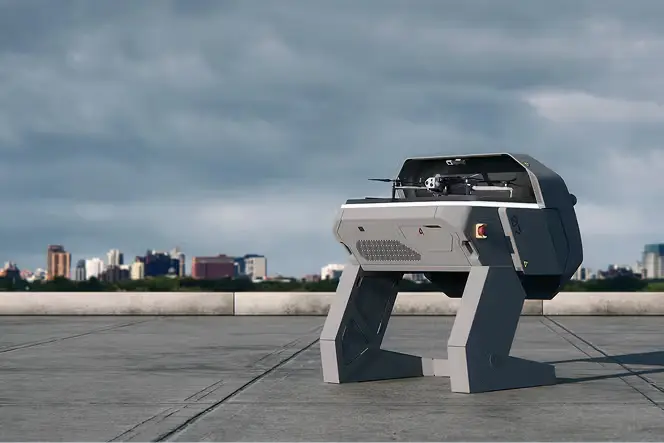 Skydio X10 drone launching from a dock system at a military airbase perimeter