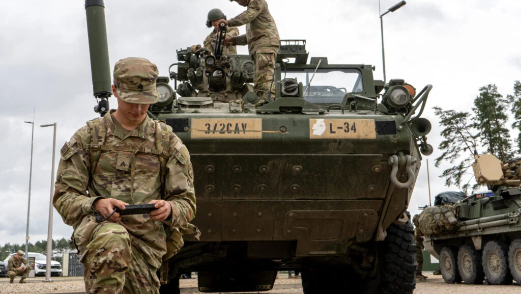 US Army electronic warfare specialist demonstrating Terrestrial Layer System Manpack at Bemowo Piskie Training Area