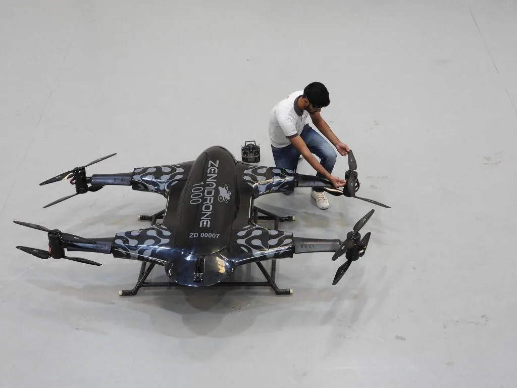 ZenaTech IQ Quad drone deployed over a land survey site in North America